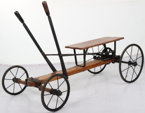 A rare Lines Bros Ltd wooden and metal hand propelled child’s cart, English circa 1925