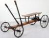 A rare Lines Bros Ltd wooden and metal hand propelled child’s cart, English circa 1925