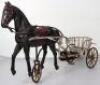 A very rare and early French pressed steel child’s pedal horse and trap, circa 1900 - 4