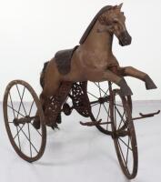 A rare child’s hand propelled chain driven mechanical sit on tricycle horse, French 19th century