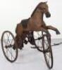 A rare child’s hand propelled chain driven mechanical sit on tricycle horse, French 19th century