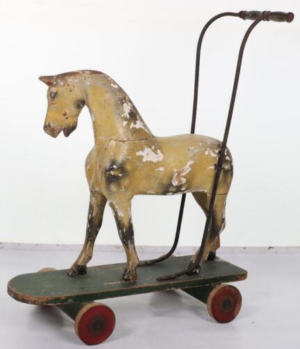 A Lines Brothers painted wooden push-along horse, 1930s