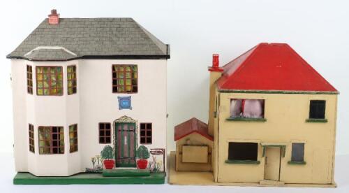 Two wooden child’s dolls houses, 1920s/30s