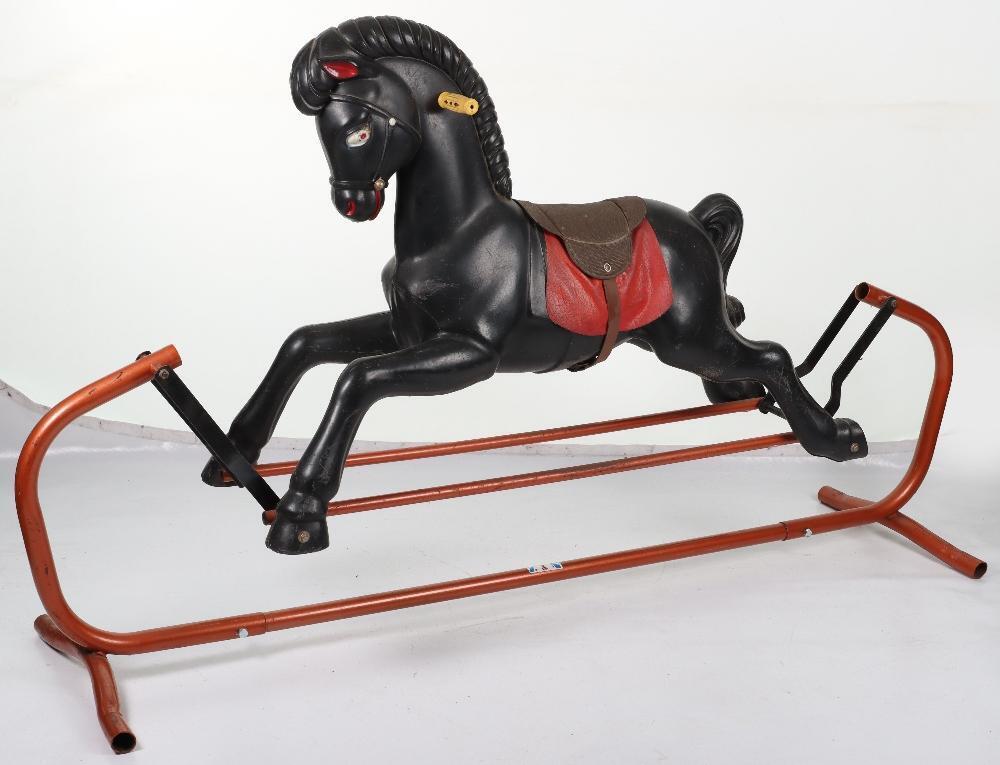 A Tri ang moulded plastic large size child s Rocking horse 1960s