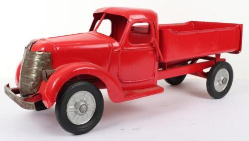 A Buddy L pressed steel tipper truck, American 1950s