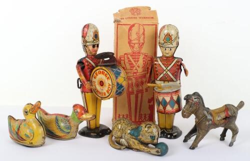 Two tinplate Marx (Swansea) wind-up Drummer Boys, 1950s