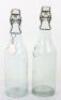 2x Glass Carlsberg Bottles with Swastika Bottle Tops
