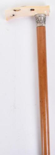 ^ Good 19th century ivory handled Malacca walking cane