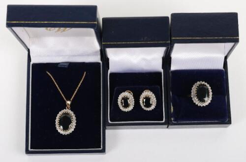A set of three 9ct diamond and sapphire including ring, pendant necklace and earrings