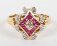 An 18ct diamond and ruby dress ring,