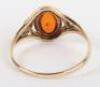 A 9ct gold and amber single stone ring - 7