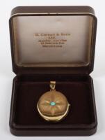 An 18ct gold and turquoise pendant locket