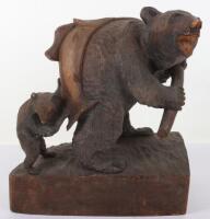 A Japanese wood carved bear and cub