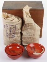 A Japanese red lacquer rice bowl set,