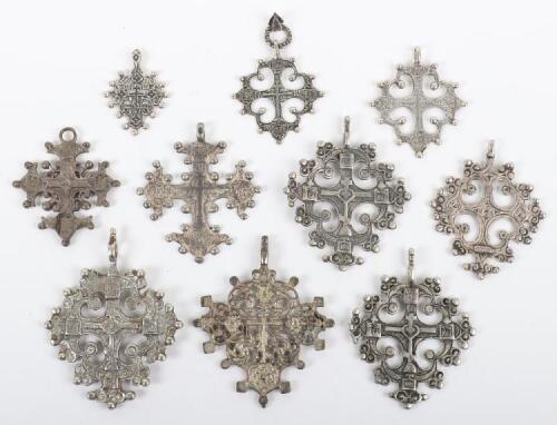 Ten Russian silver and other pendant crosses