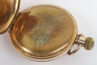 An engraved gold plated pocket watch awarded to military medal winner