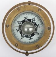 A brass ships compass