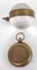 An Omega globe desk clock, 5cm