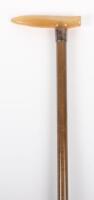 A fine early 20th century ladies walking stick, horn handle and silver collar, 76cm