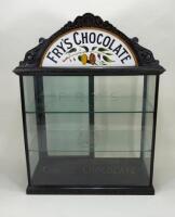 A Victorian Fry’s Chocolate counter top display cabinet,