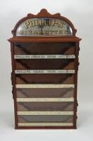 A Phillips’ Cigarettes six drawer wall cabinet dispenser, early 20th century,