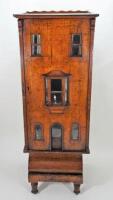 A fine walnut Dolls House, English 1820s/30s,