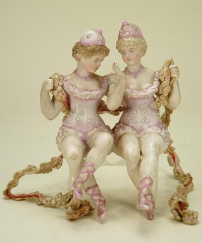 A pair of bisque figurines on swing, German circa 1910,