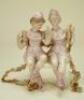 A pair of bisque figurines on swing, German circa 1910,