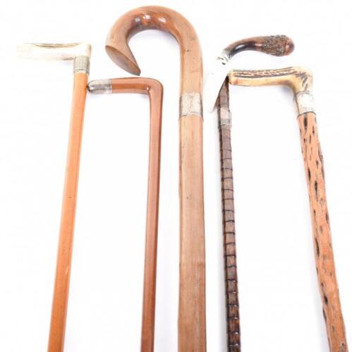 5x assorted walking sticks mostly with silver ferules