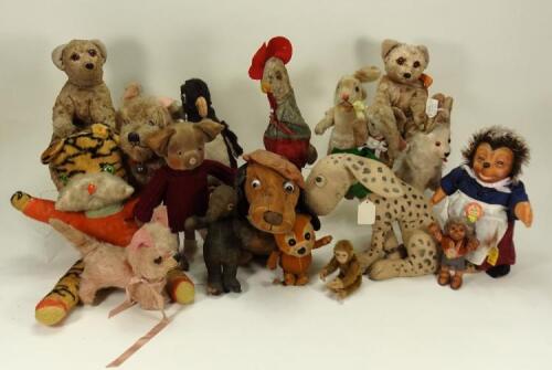 A collection of various soft toys,