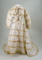 A cream silk dress for large French fashion doll, 1890s,