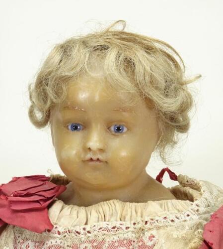 A lovely poured wax shoulder head doll, English 1860s,