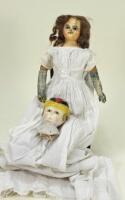 Wax over composition shoulder head doll, English circa 1860,