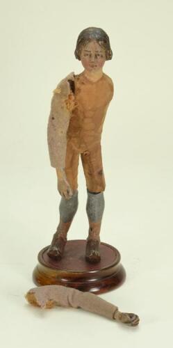 Early small carved wooden cr&egrave;che figure on stand, southern European, eighteenth century,