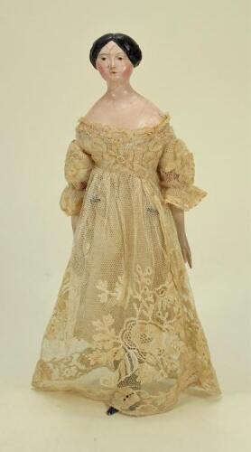 A rare papier-mache shoulder head doll, German 1830s,