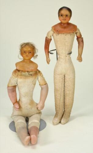 Two Early bees wax shoulder head dolls, English circa 1850,