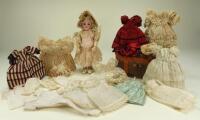 Wonderful small Kestner 155 bisque head doll with trunk and trousseau, German circa 1900,