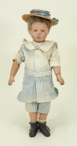 A carved wooden Shoenhut doll, German circa 1910,