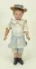 A carved wooden Shoenhut doll, German circa 1910,