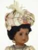 A Mulatto 1907 all original Tete Jumeau bisque head doll, French circa 1905, - 2
