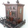 A fine and early English wooden dolls house, English 1830s, - 2
