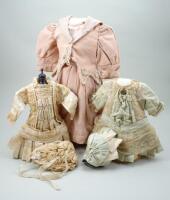 A good Ivory silk dress and bonnet for French Bebe doll,