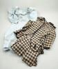 Four children&rsquo;s/ large doll dresses,