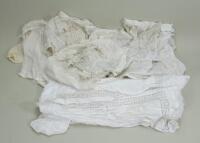 Collection of white cotton doll dresses,