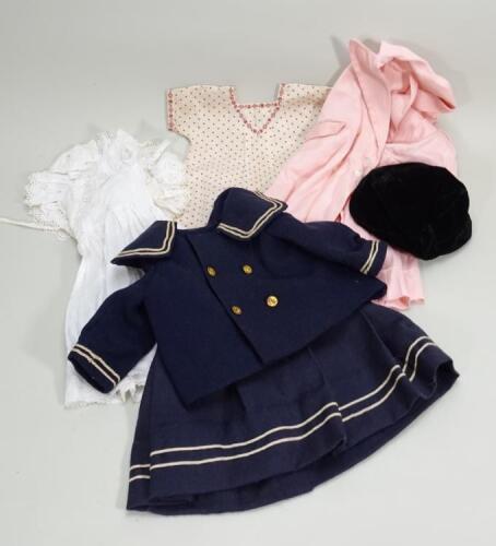 Collection of dolls clothes,