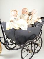Three A.M dream baby bisque head dolls in pram,