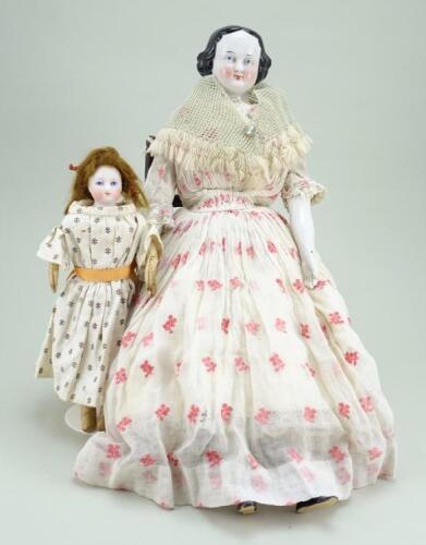 Early glazed china shoulder-head doll, German circa 1850,