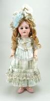 Tete Jumeau DEP bisque head doll in original clothes, German for French market, circa 1910,