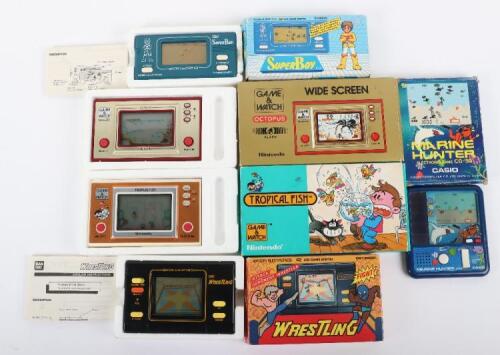 Vintage 1980s Nintendo and Bandai boxed handheld games