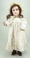 Tete Jumeau bisque head Bebe doll, size 10, French circa 1890,